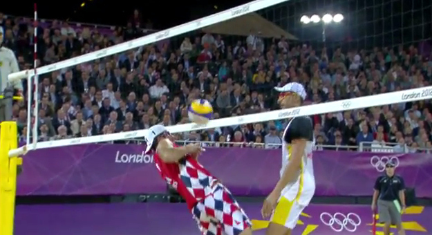 The ball then rolled down his arm to his fist, where he managed to punch it over to Dalhausser. The Spanish team argued this counted as two consecutive touches by the same player, which isn't allowed — and, after the match, Rogers admitted that he thinks the referee should have called a violation on the play.