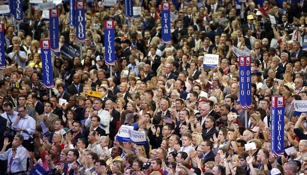 Delegates at the Republican National Convention in Tampa, Florida, cheer and watch speeches intently.