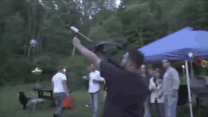 Ain't no party like a redneck party...because a redneck party will light a bonfire with a flaming crossbow bolt.