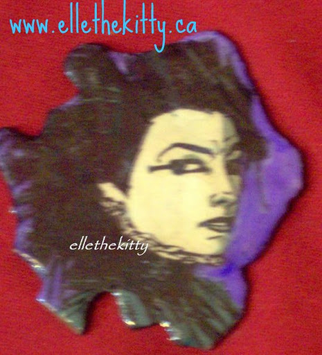 death, recycled sandman comic and background handpainted. Pin or pendant