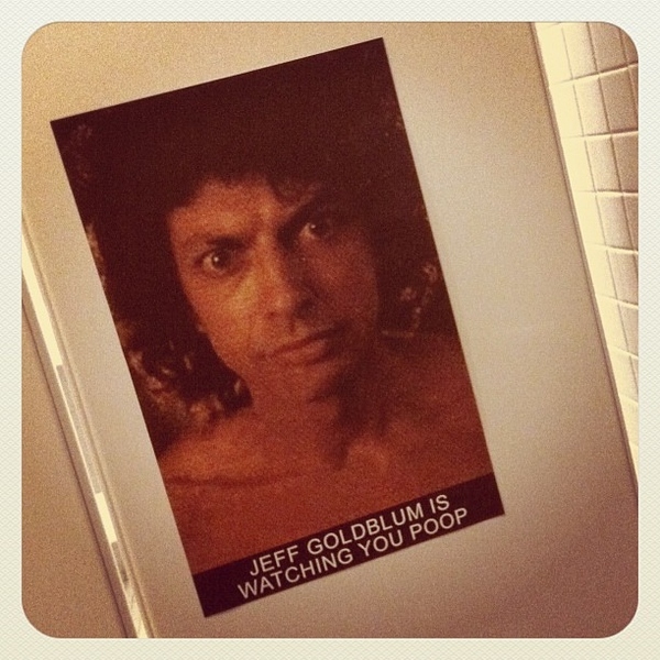 This old-school meme was installed inside a bathroom stall upstairs where Rick Astley's "Never Gonna Give You Up" played from the ceiling on a non-stop loop.