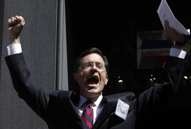 It'd be foolish not to have a politically-charged comic handle the show in an election year. Jon Stewart had his shot, and redditors love Colbert. So he's already got massive Internet support for promos.