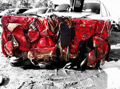 Charly Molinelli of Molinelli Designs created an awesome crashed Ferrari table using a totaled Ferrari and a coffee table.