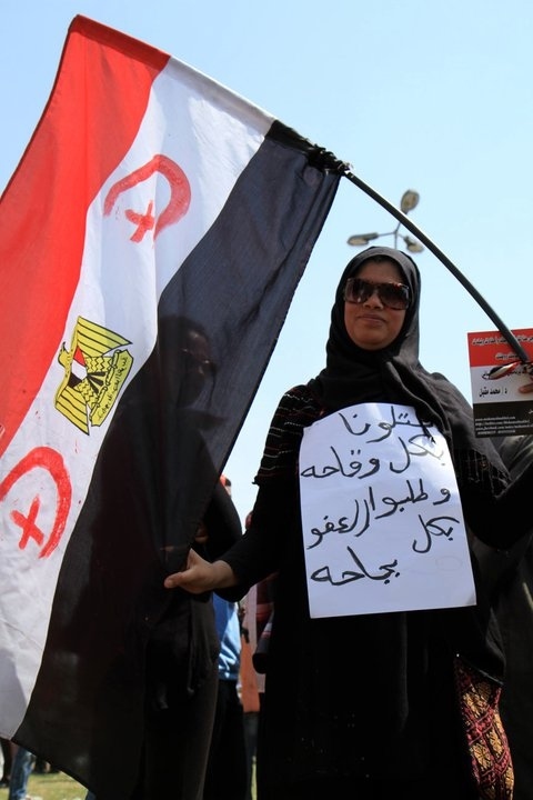 A woman interviewed by Rahimi near Tahrir Square in mid-May compares President Obama to former pr...