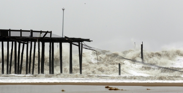 A wall of water batters what remains of the fishing pier in Ocean City, Maryland, as Hurricane Sandy intensifies, October 29, 2012.