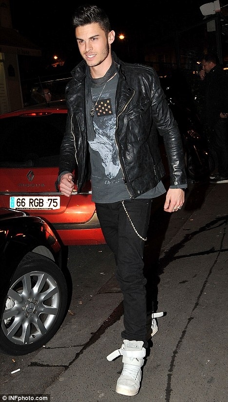 Katy was spotted out and about in Paris getting her drink on at Le Montana nightclub with model Baptiste Giabiconi!The starlette wore a sexy half cut spiked leather jacket with matching boots and a blue fitted sequin dress matching a blueberry dump on her head, that she somehow rocked... b*tch!!Baptiste, the highest paid male model and Katy were spotted at Paris Fashion Week together and rumours have been thrown around that the pair have been banging, but he is apparently world renowned fashion designer Karl Lagerfeld's toyboy. If there just friends why did they avoid being snapped together??