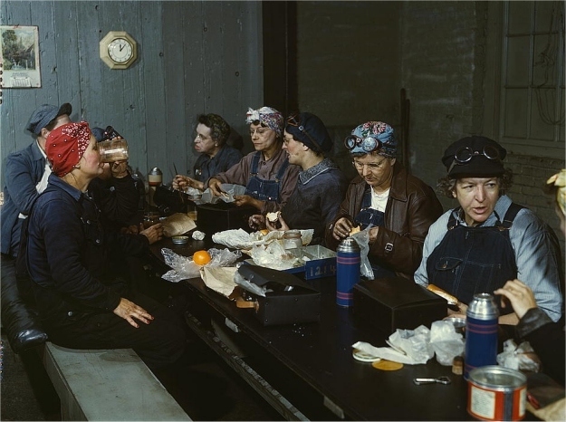 Women employed as wipers on a lunch break. Photographed by Jack Delano in April 1943.