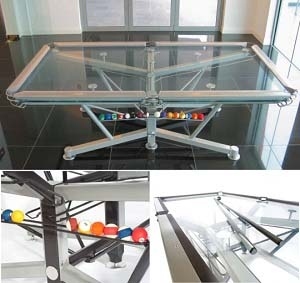 No bachelor pad should be without one of these transparent pool tables. Modern yet functional, for a small purchase price of only forty six thousand dollars this futuristic billiards table will show off your wealth and fine tastes, or possibly explain your mounting debt issues.