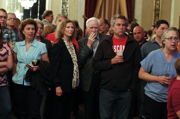 Barrett supporters watch early election returns.