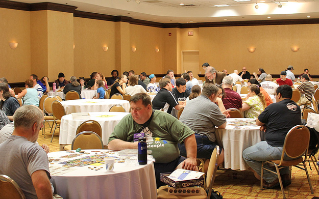 There were tons of tables where people were playing games and having a good time.