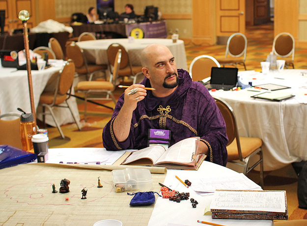 A roleplayer dons his mages robes at Dexcon 15.
