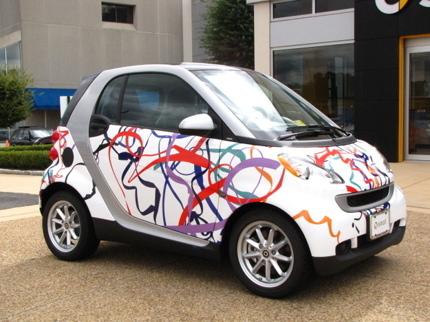 Who doesn't love getting noticed in a sweet set of new wheels? Help pick the best design wrap for the convenient smart car by voting for your favorite here.