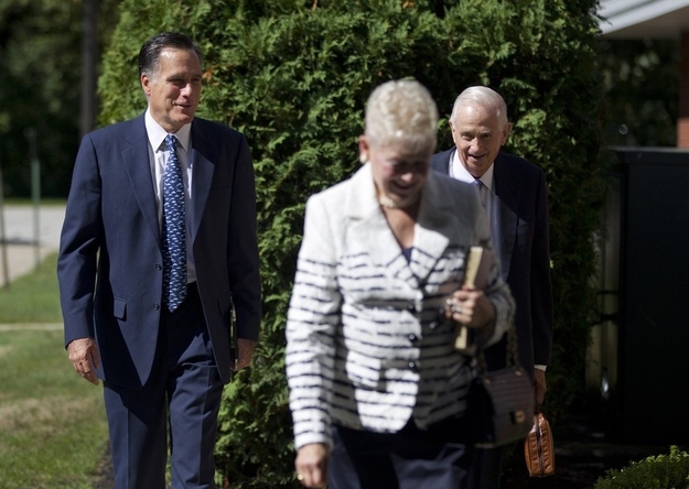 Mitt Romney enters a church service at the Church of Jesus Christ of Latter-day Saints in Wolfeboro, N.H.
