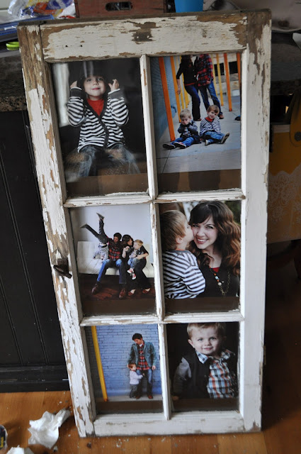 Turn an old window into a picture frame.