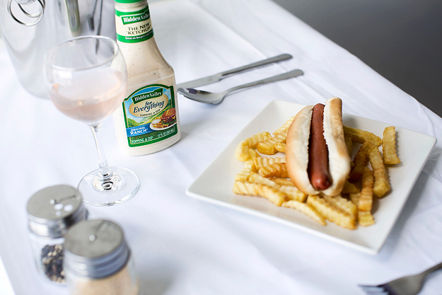 Down to brass tacks, now, with a nice hot dog! Please, note the body of the Ranch ... it is a tactile condiment, farm-fresh, with a bouquet that is creamy and rich, complementary of both the meats and the bread! This particular pairing caused a riot when I first debuted it in Auvergne! The Mayor called for peace, but a fight broke out ... over who should lead the parade!! Ah, to be young again.