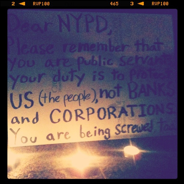 "Dear NYPD,Please rememer that you are public servants. Your duty is to protect US (the people), not BANKS and CORPORATIONS. You are being screwed, too."