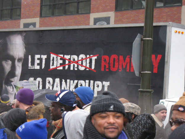 Let Mitt Romney Go Bankrupt mobile billboard parked outside the Dont Bet Against Michigan protest against Mitt Romney.