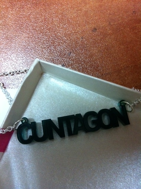 If you are wondering what this means, it is a gathering of "cunts". Wearing this necklace is undoubtedly a great way of assembling said "cunts".