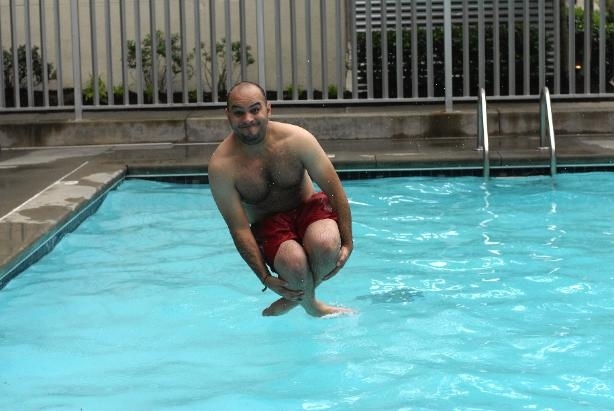 Don't just sit by the pool, act like the fat kid in Sandlot and scream "Cannonballlll" as obnoxiously loud as you can and jump in the pool. Believe us, it's therapeutic