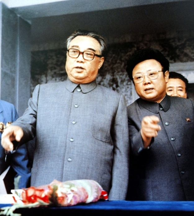 Kim Il-Sung talking to his son Kim Jong-Il
