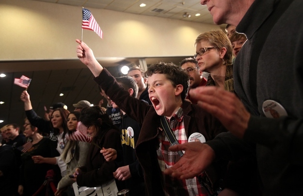 A young supporter of Republican presidential candidate U.S. Congressman Ron Paul celebrates at Paul's New Hampshire primary night rally in Manchester.