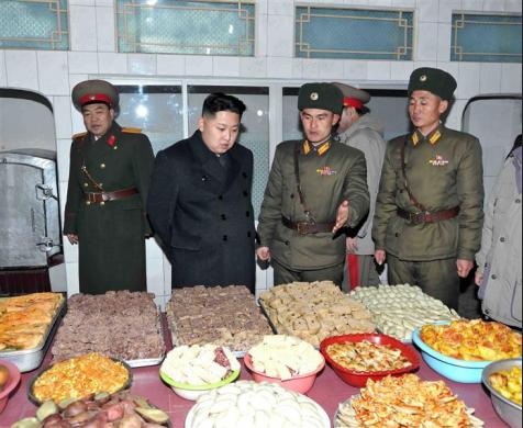 North Korea's new leader Kim Jong-un (2nd L) visits the Seoul Ryu Kyong Su 105 Guards Tank Division of the Korean People's Army (KPA) in Pyongyang, in this picture released by KCNA January 1, 2012.