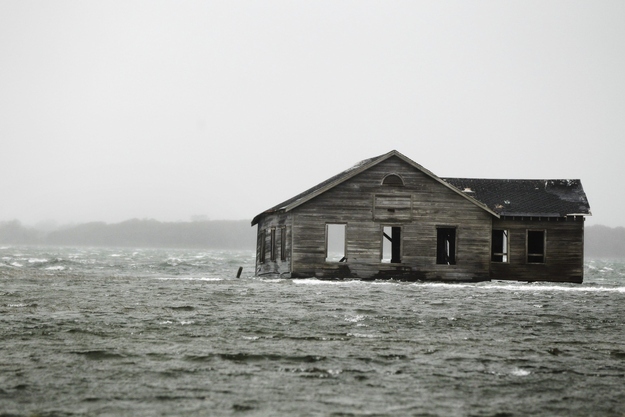 An abandoned home is inundated with water at Shinnecock Bay in Southampton, New York, October 29, 2012.