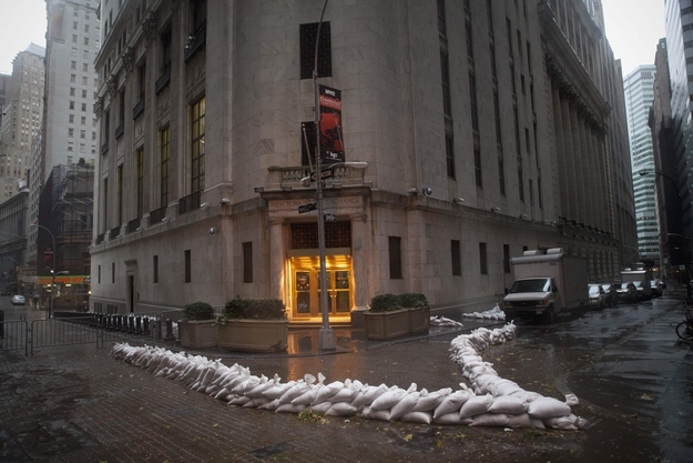 Sandbags block the entrance of the New York Stock Exchange in downtown Manhattan as Hurricane Sandy made its approach in New York, October 29, 2012.