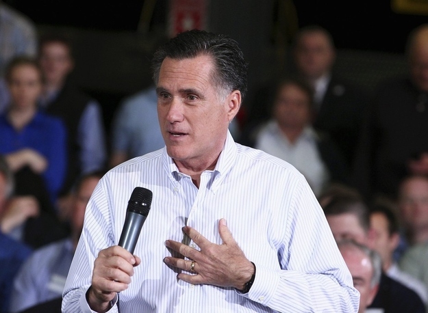 U.S. Republican presidential candidate Mitt Romney speaks with workers and supporters at Thompson Tractor in Birmingham, Alabama March 9, 2012.