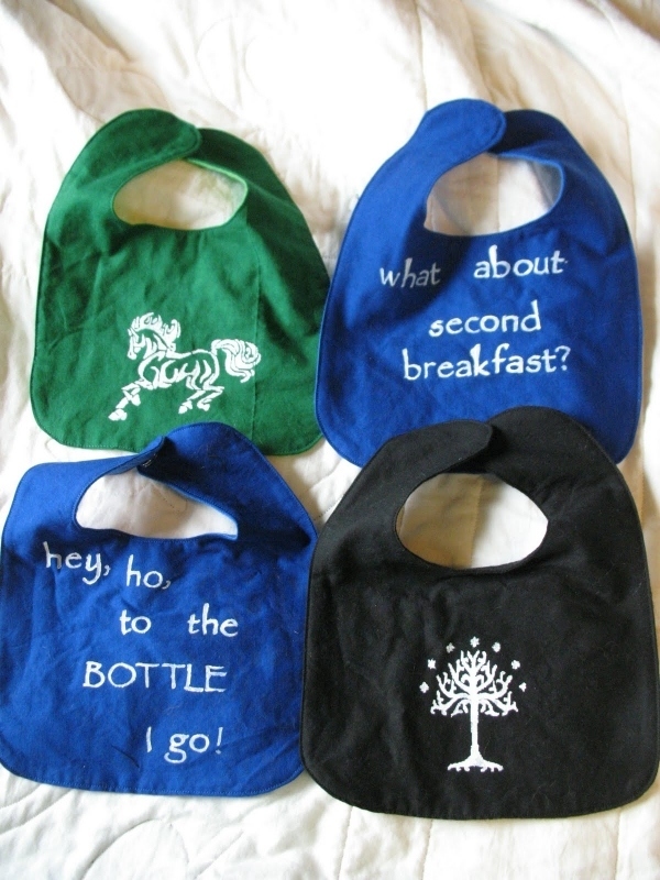 What about second breakfast? These bibs are my favorites, but they're not for sale anywhere. You may want to talk to the creator of the Sew-and-So blog about that. Trust me, if little Aragorn or Arwen is a true nerd, the kid will appreciate the obscurity of these references; there's no ring mentioned, after all.