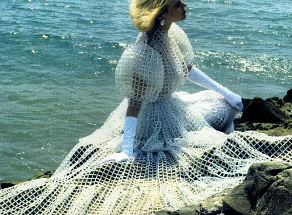 This dress is actually on sale for $247,000. The $100k asking price is only the down payment. What a steal! They are asking for 10-12 months advance notice so you better find your sugar daddy ASAP.FROM THE SELLER:WELCOME TO MY WEBSTORE!*** The price of $100,000.00 listed above will represent a down payment on your order. Please, see detailed information below for the full price for this Fairy Tell Wedding Gown.This original version of Lalik (Vintage Inspired Wedding Gown displayed on the pictures), has been created in 1985 in Paris, France. It has not only required 1570 hours (10 months total of work) to be completed, but also, it has been hand weaved using expensive Crystal beads with the iridescent and magnificent Aurora Borealis Finish. The underskirt crinoline Petticoat is fully handmade and created to support the fullness (gonflant) of the skirt of the Gown.This listing showing here is a full package which includes the Wedding dress (sleeveless dress with shoulder straps, along with the fully hand beaded underskirt crinoline Petticoat, and a full circled skirt jacket with balloon sleeves) the Necklace, two bracelets and a pair of earrings, long gloves, and the beaded handbag.If you are interested about placing an order on this wedding gown, I could send you a couple of sample of these unique and beautiful beads on a separate listing for $2.00 with free shipping.This Vintage Inspired Wedding Gown is an OOAK (One of a Kind) Luxury Bridal and Fairy Tell creation and will be delivered with a Certificate of Authenticity and a full exclusivity on your chosen style and design. The Designer (me the Seller) will travel nationwide in the US, paying trip expenses and personally providing fitting and size adjustment. Also, Lalik Wedding Dress will be hand-delivered in person (with final fitting if necessary) by Designer. If Buyer does not reside in the US and cannot travel to meet us in the US, arrangement will be made with date and location for fitting and delivering. The price for this listing is $247,000.00. Considering the maximum price applicable on Etsy is $100,000.00, we are offering a payment with installments by breaking the $247,000.00 price down into 3 different portions payable on Etsy as follow: - $100,000.00 down payment (which could be listed on Etsy with the label "RESERVED") to confirm the order- $77,000.00 second portion payable on Etsy during the first dress-fitting session and- $70,000.00 third portion also payable on Etsy after the last dress-fitting session on the day of the delivery.You may choose the wide layered skirt as shown of this listing, or an “A” shaped, or a Mermaid shaped skirt. The cost of the package is lower in these two cases. -When you choose a straight (pencil) or an “A” shaped skirt along with the same jacket (with balloon sleeves) shown on this listing, the package costs $127,000.00 which is payable in 3 installments (1. $67,000.00 - 2. $30,000.00 and 3. $30,000.00).-When you choose a full circled or Mermaid shaped skirt along with the same jacket (with balloon sleeves) shown on this listing, the package costs $187,000.00 which is also payable in 3 installments (1. $97,000.00 - 2. $45,000.00 and 3. $45,000.00).Lalik Wedding Dress is made-to-measure to the exact size of the Buyer. The length of the wide layered skirt can be adjusted to meet your request. The price listed covers sizes between 4 and 10. Price estimation will be accordingly provided for sizes above 10. Please, allow 10 to 12 months (1570 hours of labor) for completion.(Lalik Wedding Dress is a "Gisèle Gomez, Paris France" Creation)