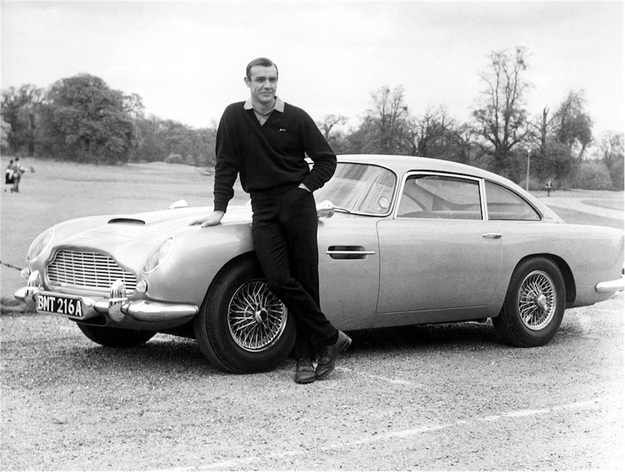 007 has (rightfully) had a thing for Aston Martins for the majority of his storied career, but perhaps none quite as badass as the DB5 of the Sean Connery era. Ever since it first appeared in 1964's Goldfinger, this bad boy has repped the "most famous car in the world" moniker pretty well, to say the least. Daniel Craig's DBS V12 is no joke either, but none feature as many "handy features" as the DB5. For starters, it's got bulletproof windows, oil slicks and a variety of other defense mechanisms, revolving license plates, and—of course—an ejector seat. Deal with that.