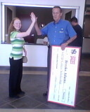 Melbourne, FL Mayor Harry Goode high-fived our scholarship winner to celebrate.