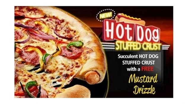 Old and busted: Pizza crust.The new hotness: Pizza crusts as bready platforms for any-and-all "American" and/or local flavors. Now with free mustard*!!Two/several/many great tastes that taste great together? Or a horrific omen of impending culinary apocalypse? You decide!