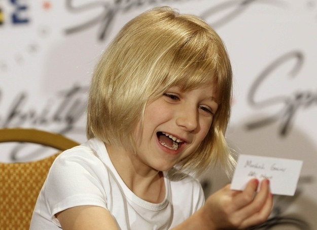 Six-year-old Lori Anne Madison laughs at a question during a news conference at the Scripps National Spelling Bee semi-finals at National Harbor, Maryland May 31, 2012. Madison, who was eliminated in Wednesday's round, is the youngest speller in the Spelling Bee's history.