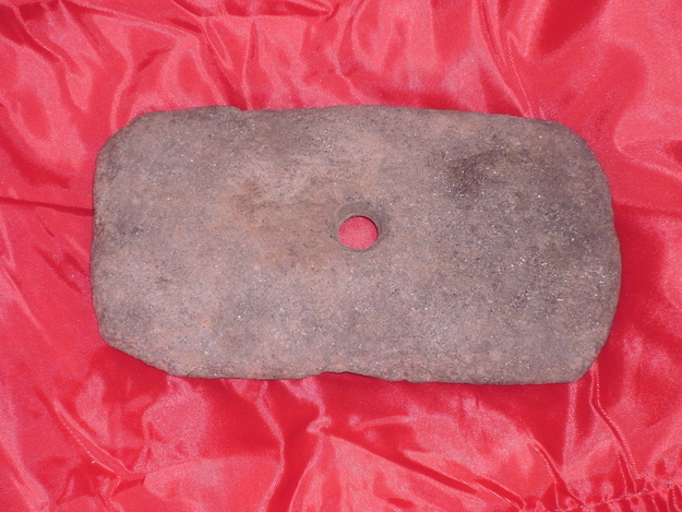 Auction Title:"SUPER RARE 5 1/2 INCHES LONG I FIND A LOT OF BROKEN ONES IN THE TEN YEARS I LOOK"Auction Description:"ONLY 1 WHOLE 1 IN TEN YEARS SO IM NOT GOING TO GIVE IT AWAY MUSEUM QUALITY"It's museum quality rock with a hole in it, from, I'm going to guess some kind of continent. Item may be old. You should buy it.