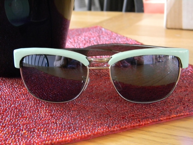 Three layers of mint nail polish + one coat of clear polish = a $5 version of these $114 Juicy Couture frames.