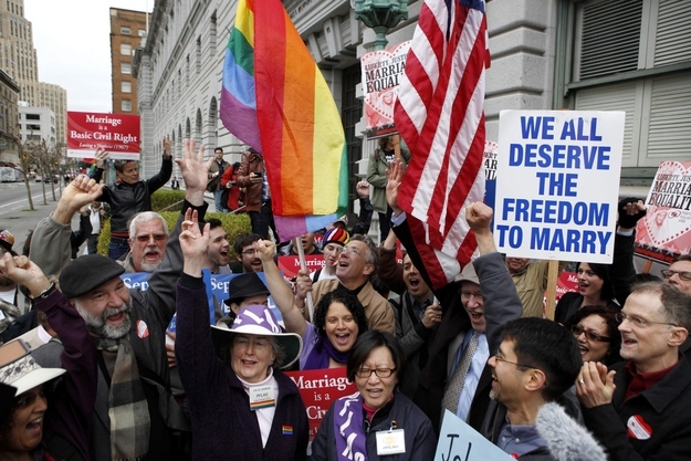 Advocates of same-sex couples' marriage rights cheer during a rally opposing Proposition 8 outside the Ninth Circuit Courthouse in San Francisco, California, in this February 7, 2012 file photo.