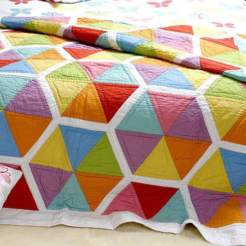 A perfect quilt for cuddling- sold by Not On The High Street.