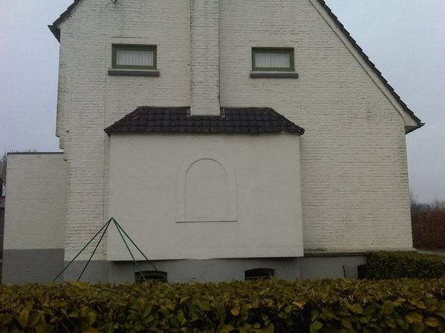 "U don’t build houses that look like funny faces unless u are retard chimp." - Ugly Belgian Houses