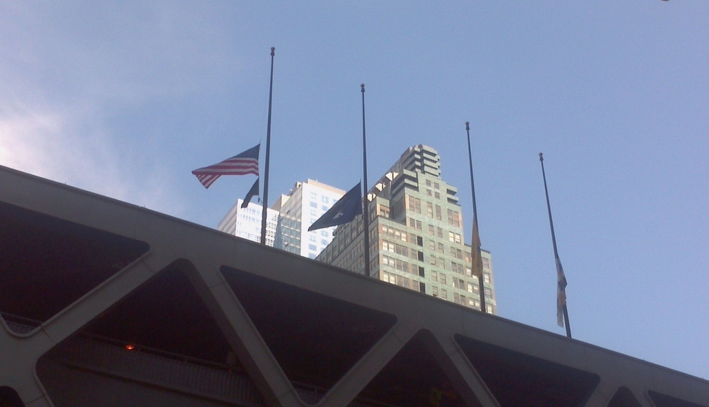 Flags above the Port Authority after the Aurora, Colorado gun massacre.