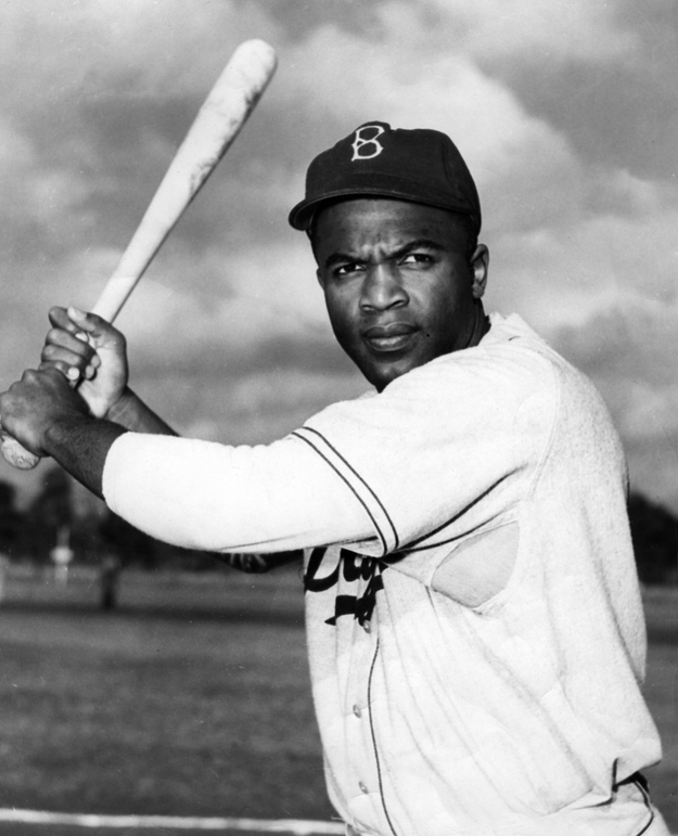 When Jackie Robinson debuted in 1947 for the Brooklyn Dodgers he would help pioneer the desegregation within professional sports. He would overcome racism and hostility which had kept black players from the Major Leagues. He would go on to become the 1947 Rookie of the Year as well as the 1949 NL MVP. Robinson was inducted into the Baseball Hall of Fame in 1962. In 1997, Major League Baseball universally retired his uniform number, 42, across all major league teams; the first pro athlete in any sport to be so honored.