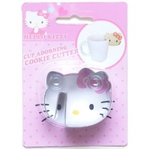 Oh look, you can hang your Hello Kitty cookie off of your Hello Kitty coffee cup filled with coffee brewed in the Hello Kitty coffee maker.