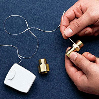 TOH general contractor Tom Silva has used dental floss instead of Teflon tape, to block leaky gaps around parts that screw into place. He just winds a length around the fitting's threads half a dozen turns before screwing it on. Click through for lots of other ways to to floss like a DIY boss .