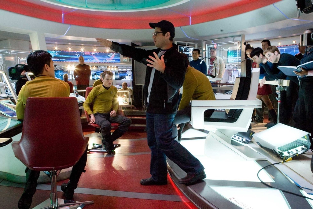 The director for Star Wars Episode VII has been revealed, and it is J. J. Abrams, according to The Wrap. While we don’t have a release from LucasFilm at this point, the Wrap reports that Abrams will do the film, despite his proclamation to the contrary last year. The report says that other directors such as Ben Affleck were in contention for the gig, but that new LucasFilm head Kathleen Kennedy has been heatedly courting Abrams for the job. This represents a unification of sorts for two big franchises, as Abrams has also been shepherding the revival of Star Trek at Paramount. What effect this will have on his position there remains to be seen. Our sources have been telling us for a while now that Steven Spielberg was really pushing Kennedy to hire Abrams. The story goes that Abrams was the first filmmaker approached after Spielberg, but was very hesitant. Kennedy talked to other directors including Ben Affleck and also Matthew Vaughn who may have pitched to have Chloë Grace Moretz in the lead role. Our sources say that Spielberg was instrumental in convincing Abrams and Kennedy to make it happen. At the recent Star Trek Into Darkness event, we asked Abrams about this possibility. He admitted that he’d been asked but was almost too intimidated by the possibility. He also said he didn’t think he wanted to be the one handling both “Star” franchises, Wars and Trek. That said, Abrams hinted it was still a possibility. Abrams has also long said, especially when he first started Star Trek, that he was a much bigger Star Wars fan. Knowing that, we asked him what he thought of the story and script and he admitted he really liked itAbrams previously said about the possibility of more Star Wars films:“Part of me? Thrilled. Part of me? Terrified. Most of me? Thrillified.”And when he asked about potentially helming Episode 7: “Look, Star Wars is one of my favorite movies of all time,” J.J. gushed. He added, “I frankly feel that – I almost feel that, in a weird way, the opportunity for whomever it is to direct that movie, it comes with the burden of being that kind of iconic movie and series. I was never a big Star Trek fan growing up, so for me, working on Star Trek didn’t have any of that, you know, almost fatal sacrilege, and so, I am looking forward more then anyone to the next iterations of Star Wars, but I believe I will be going as a paying moviegoer!”More details as we get them.