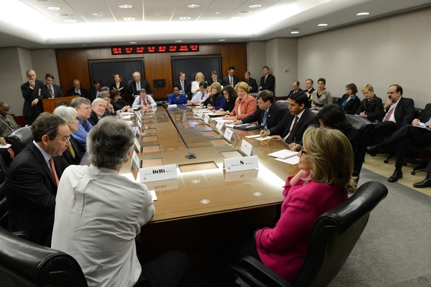 Here, Secretary of State Clinton chairs her weekly meeting of the Assistant Secretaries of State at the State Department in Washington.