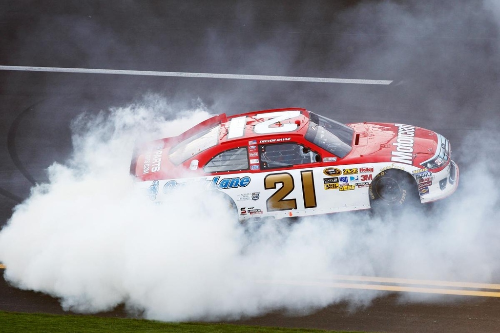 Trevor Bayne joined the historic Wood Brothers racing for the 2011 Daytona 500, and quickly earned the respect of his follow drivers, most notably Jeff Gordon, during the speedweeks. Content to push David Ragan to victory, Bayne inherited the lead after Ragan was black flagged for changing lanes on the restart before taking the green flag. Bayne held off Bobby Labonte and Carl Edwards during a second green-white-checkered finish to become the youngest winner of the 500, besting Gordon's record by five years.