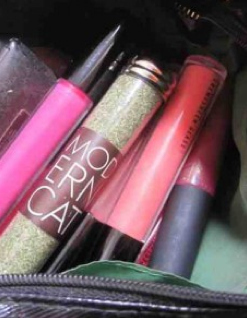 During a strategy session at work I reach into my make-up bag for lip-gloss and instead procure a vial of…catnip.