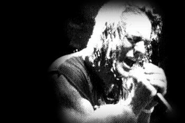 On Dec. 15, Holy Terror vocalist Keith Deen passed away from cancer at the age of 56. Deen provided vocals for Holy Terror’s two full-lengths, ‘Terror and Submission’ and ‘Mind Wars.’Holy Terror guitarist Kurt Cofelt wrote a heartfelt message to Deen after his death. Cofelt writes, “Thank your for Roaring at me. Thank you for Screeching at me. Thank you for Yelling at me. Thank you for Singing to me.”