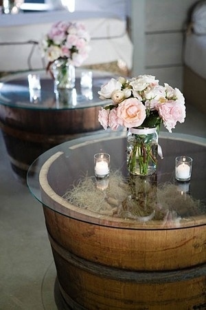 Make these simple tables out of $30 whiskey barrels.